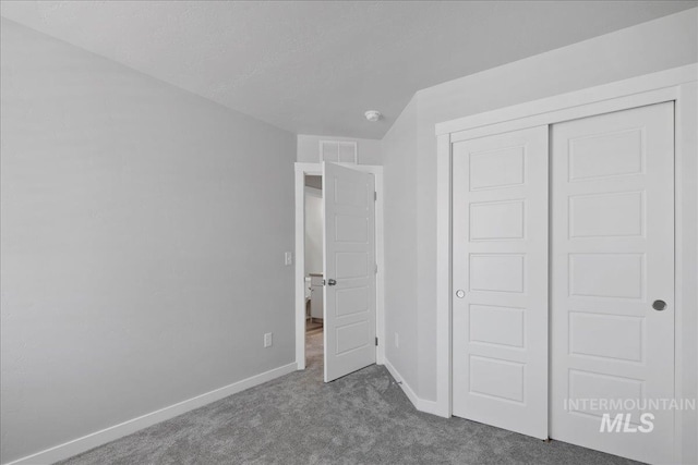 4953 W Apgar St, Meridian, ID 83646 - unfurnished bedroom featuring carpet flooring, baseboards, and a closet