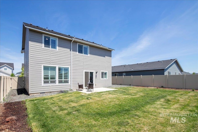 4953 W Apgar St, Meridian, ID 83646 - back of house with a patio area