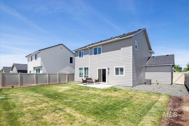 4953 W Apgar St, Meridian, ID 83646 - rear view of house with a patio, central AC unit, and a gate