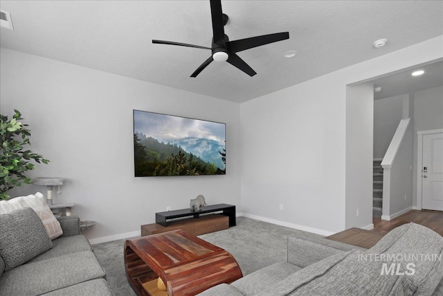 4953 W Apgar St, Meridian, ID 83646 - carpeted living area featuring ceiling fan, baseboards, and recessed lighting