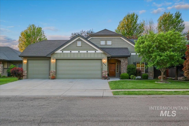 506 E Havasu Falls St, Meridian, ID 83646 - craftsman house with stone siding, an attached garage, and board and batten siding