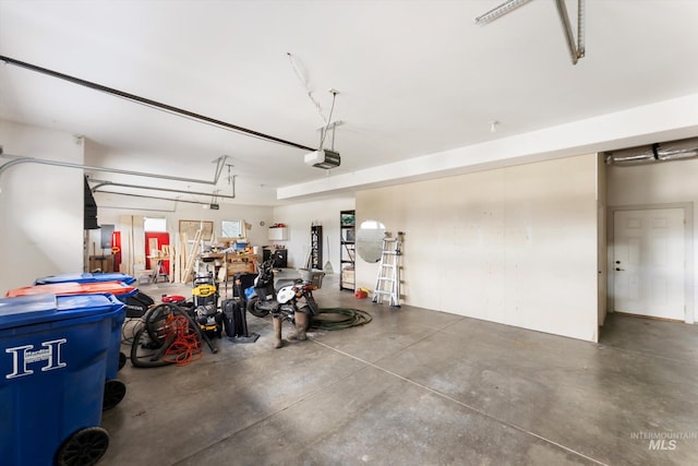 garage featuring a garage door opener