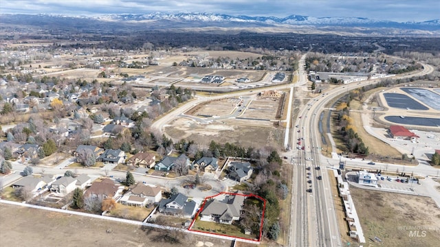 aerial view featuring a residential view and a mountain view