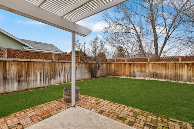 view of yard featuring a fenced backyard, a pergola, and a patio