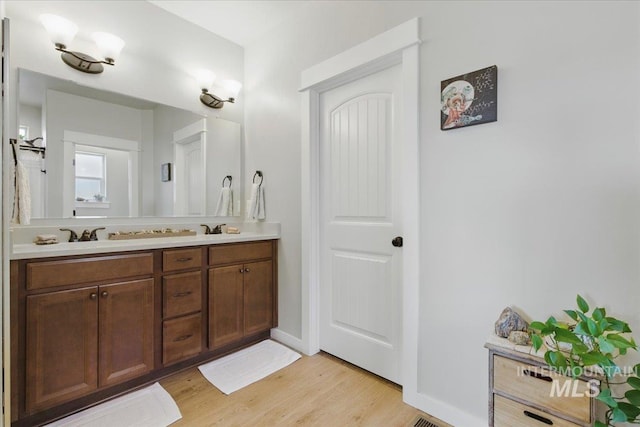 5707 W Elk Trail St Unit 630, Boise, ID 83714 - full bath with double vanity and wood finished floors