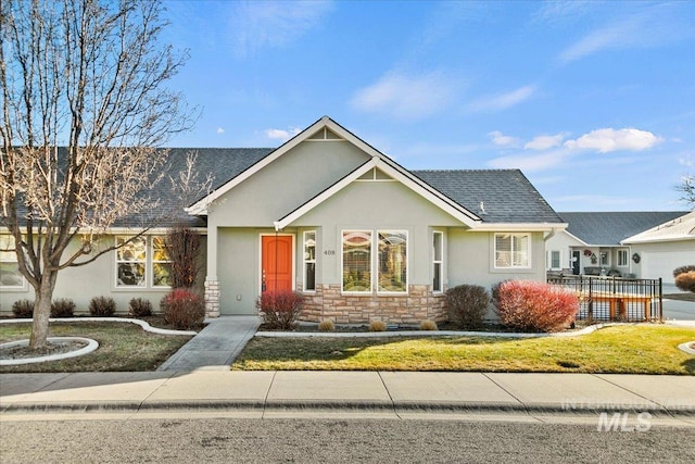 view of front of house with a front lawn