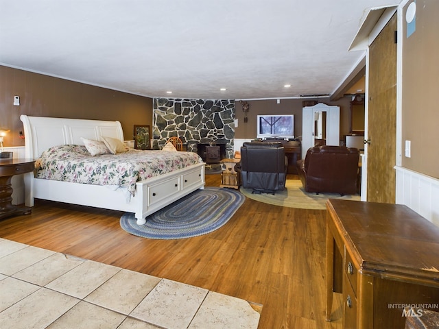 bedroom with light wood-type flooring