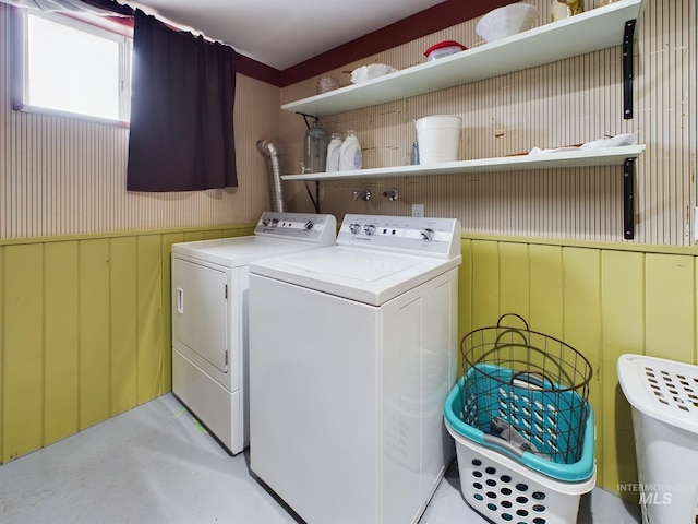 washroom featuring washer and dryer