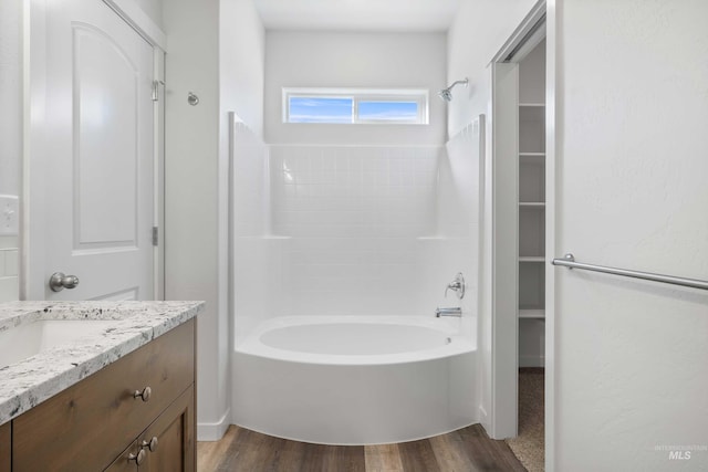 205 W 13th Ave, Jerome, ID 83338 - full bath with wood finished floors, bathing tub / shower combination, and vanity
