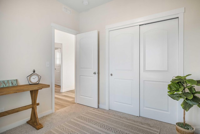 205 W 13th Ave, Jerome, ID 83338 - bedroom with light colored carpet, a closet, and baseboards