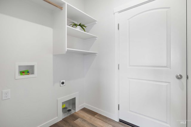 205 W 13th Ave, Jerome, ID 83338 - washroom with hookup for a washing machine, electric dryer hookup, wood finished floors, and baseboards