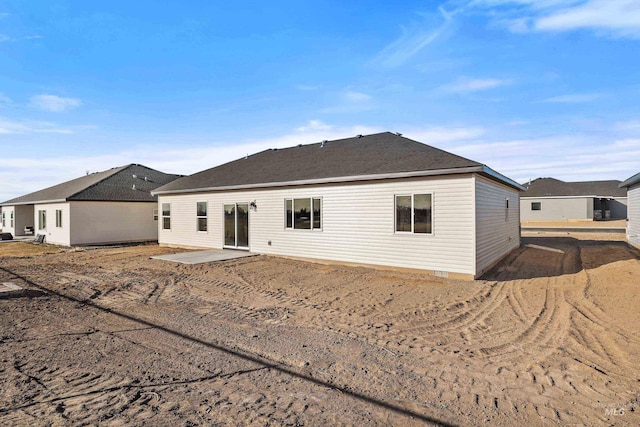 205 W 13th Ave, Jerome, ID 83338 - back of house featuring a patio area and crawl space