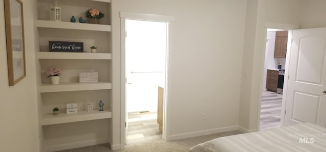 205 W 13th Ave, Jerome, ID 83338 - bedroom featuring baseboards and light colored carpet