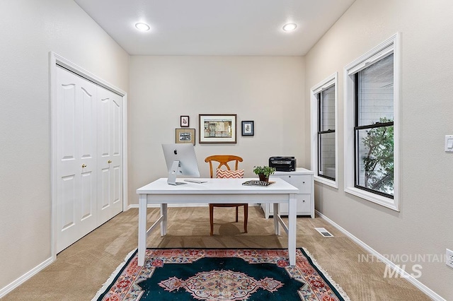 office area featuring carpet floors, recessed lighting, visible vents, and baseboards