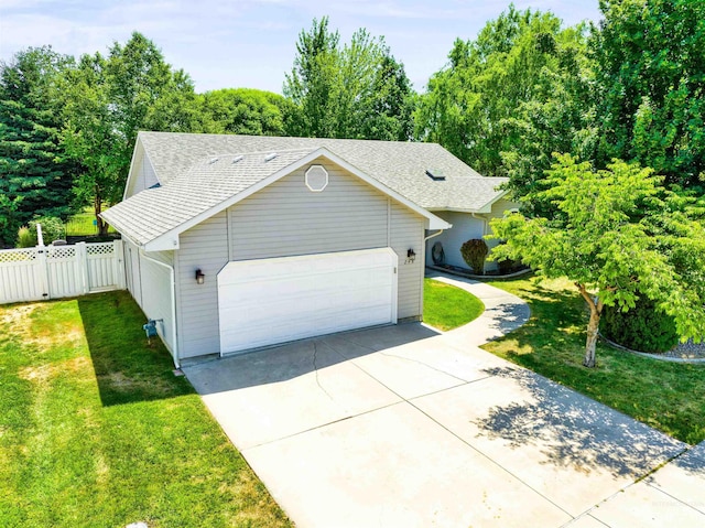 248 N Palmetto Dr, Eagle, ID 83616 - view of side of property featuring a garage, driveway, and a shingled roof