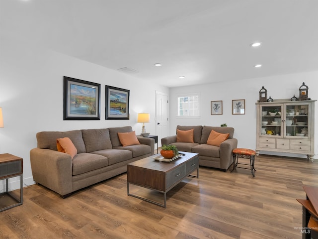 248 N Palmetto Dr, Eagle, ID 83616 - living room with wood finished floors and recessed lighting