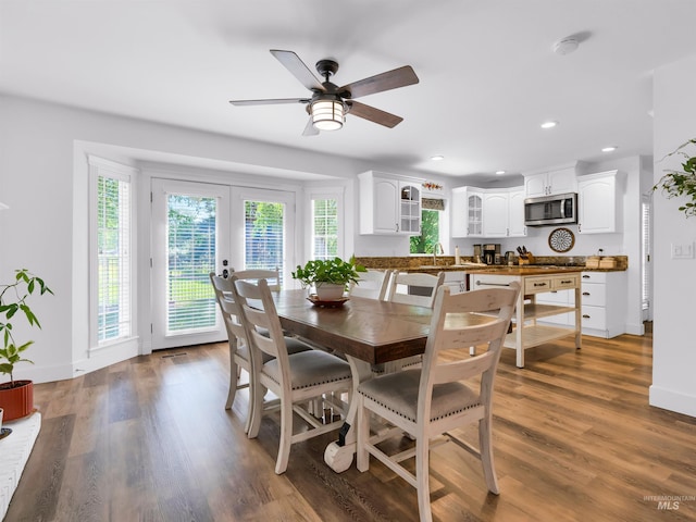 248 N Palmetto Dr, Eagle, ID 83616 - dining space featuring recessed lighting, a ceiling fan, wood finished floors, and french doors