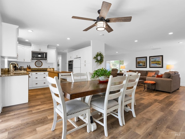 248 N Palmetto Dr, Eagle, ID 83616 - dining room featuring recessed lighting, a ceiling fan, and wood finished floors