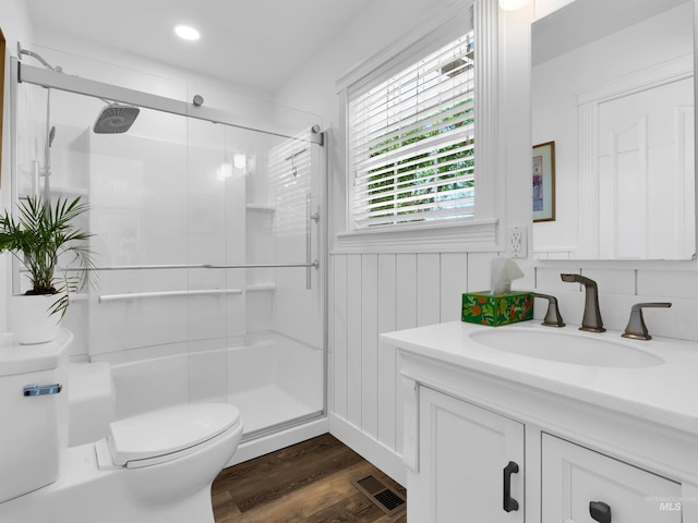 248 N Palmetto Dr, Eagle, ID 83616 - bathroom with a stall shower, vanity, wood finished floors, and recessed lighting