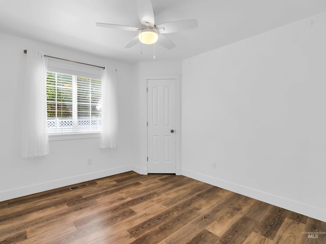 248 N Palmetto Dr, Eagle, ID 83616 - spare room with a ceiling fan and wood finished floors