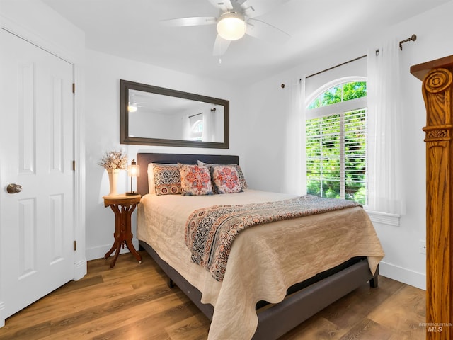 248 N Palmetto Dr, Eagle, ID 83616 - bedroom with wood finished floors and a ceiling fan
