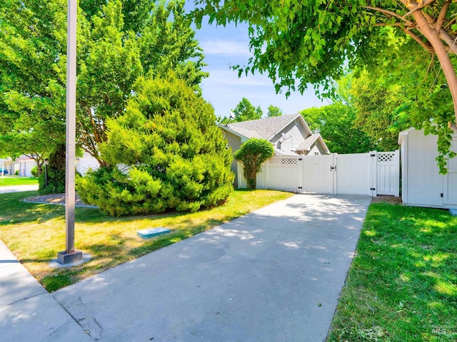 248 N Palmetto Dr, Eagle, ID 83616 - view of front of house featuring a gate and driveway