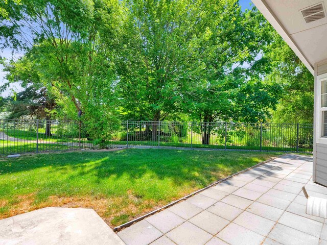 248 N Palmetto Dr, Eagle, ID 83616 - view of yard featuring a patio
