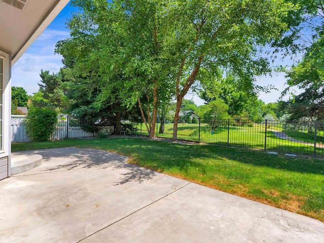 248 N Palmetto Dr, Eagle, ID 83616 - fenced backyard with a patio