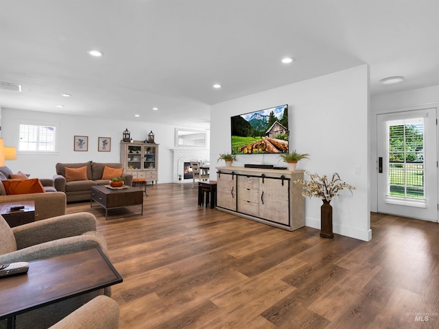 248 N Palmetto Dr, Eagle, ID 83616 - living area with recessed lighting, wood finished floors, and a fireplace