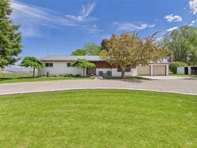 1929 S 2350 E, Malta, ID 83342 - view of front of home with a front yard, driveway, and a garage