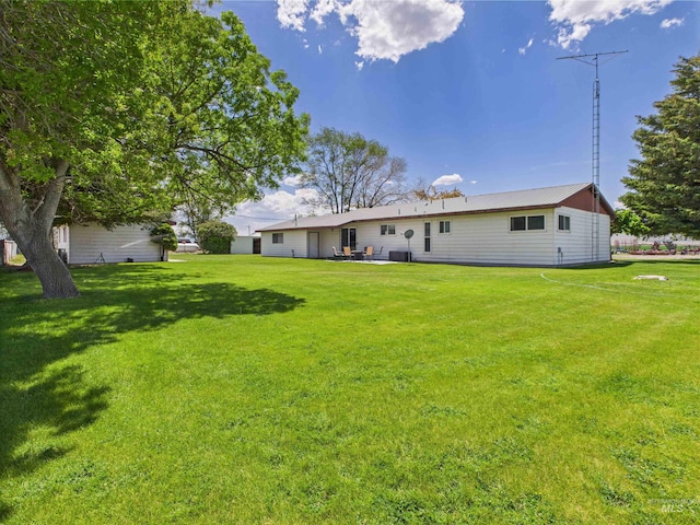 1929 S 2350 E, Malta, ID 83342 - rear view of property with a lawn