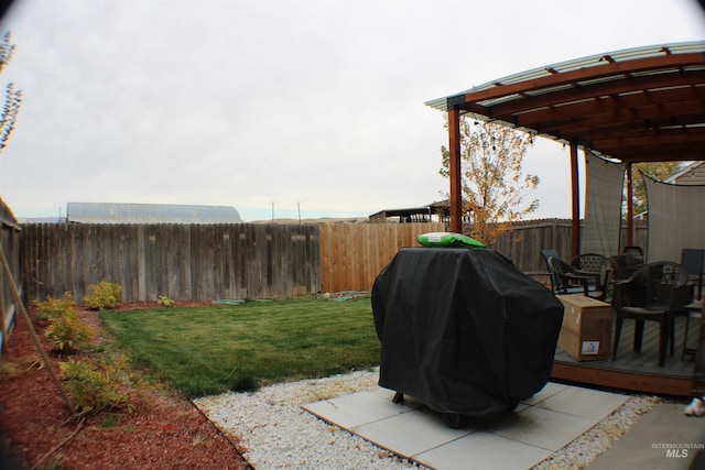 view of yard featuring a fenced backyard and a wooden deck