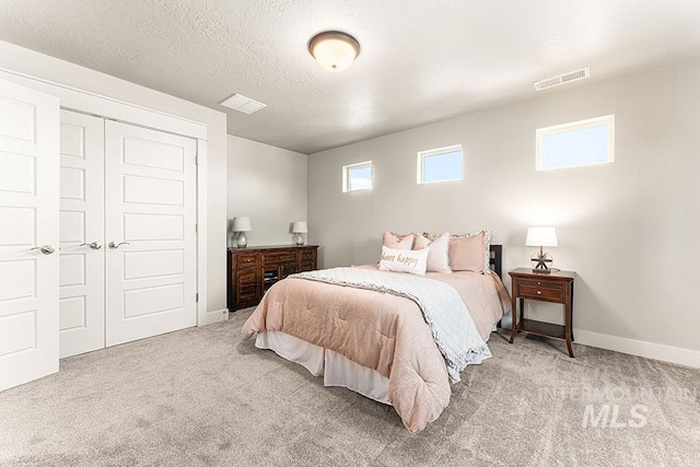 59 S Ravine Way, Nampa, ID 83687 - carpeted bedroom featuring a closet and baseboards