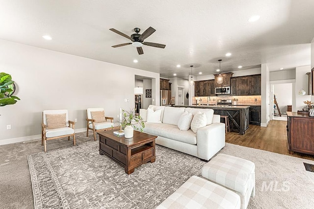 59 S Ravine Way, Nampa, ID 83687 - living area with recessed lighting, ceiling fan, and baseboards