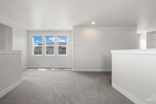 3051 S Sedgebrook Ln, Eagle, ID 83616 - carpeted empty room with baseboards and recessed lighting