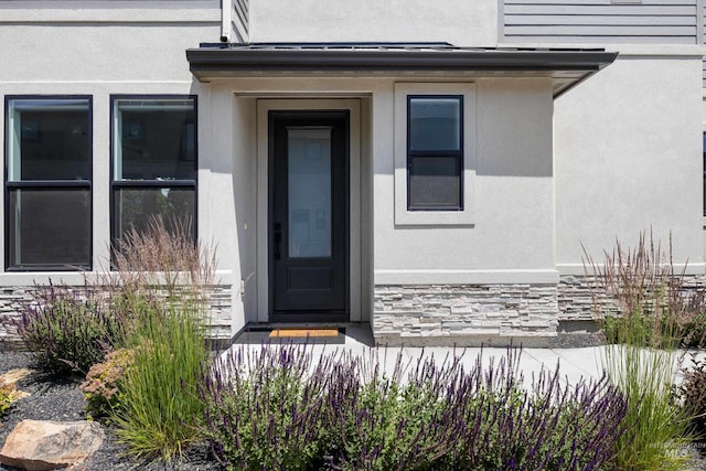 3051 S Sedgebrook Ln, Eagle, ID 83616 - property entrance featuring stone siding and stucco siding