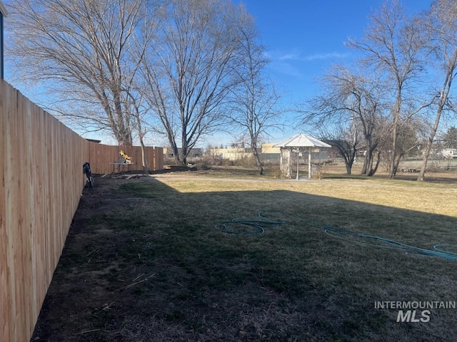 view of yard featuring fence