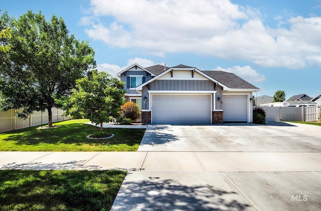 1234 W Sagwon Dr, Kuna, ID 83634 - craftsman-style home featuring an attached garage, board and batten siding, concrete driveway, and roof with shingles