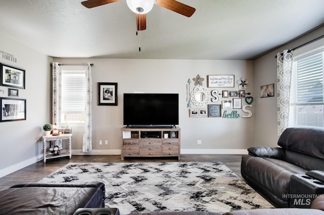 1234 W Sagwon Dr, Kuna, ID 83634 - living area with ceiling fan, wood finished floors, and baseboards