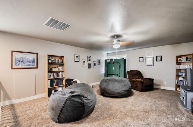 1234 W Sagwon Dr, Kuna, ID 83634 - sitting room featuring carpet floors, ceiling fan, and baseboards