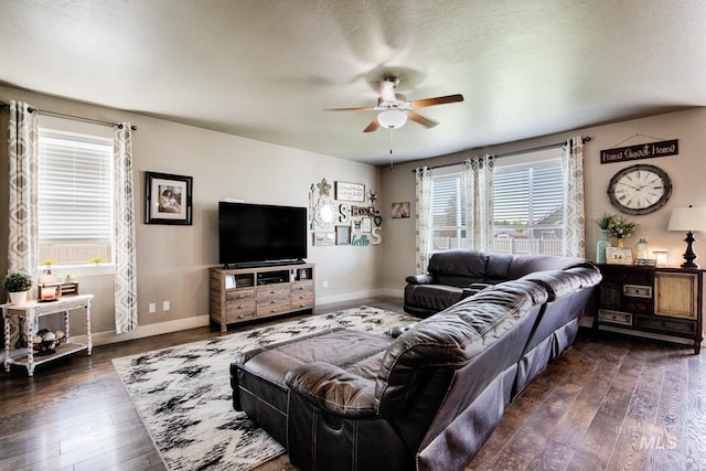 1234 W Sagwon Dr, Kuna, ID 83634 - living area with ceiling fan, dark wood-type flooring, and baseboards