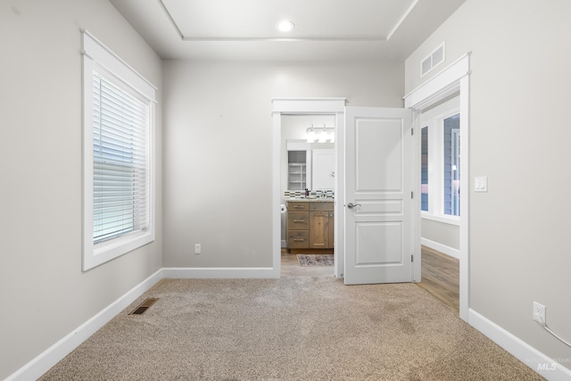10685 W Evelia St, Boise, ID 83709 - unfurnished bedroom featuring light colored carpet and connected bathroom