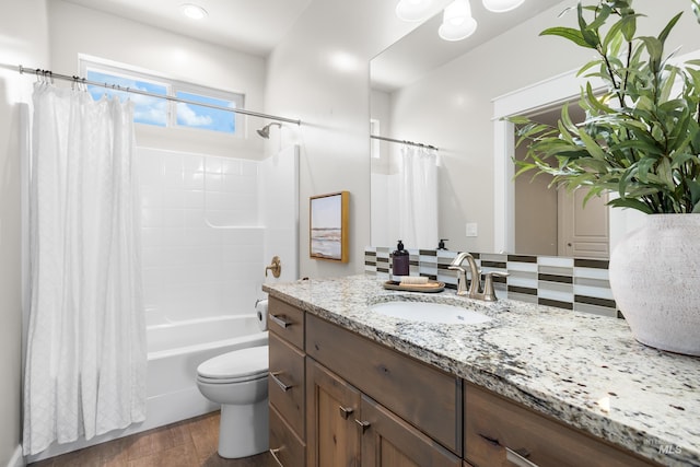 10685 W Evelia St, Boise, ID 83709 - bathroom with vanity, shower / bath combination with curtain, and wood finished floors
