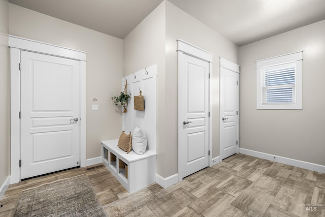 10685 W Evelia St, Boise, ID 83709 - mudroom with baseboards and light wood-type flooring