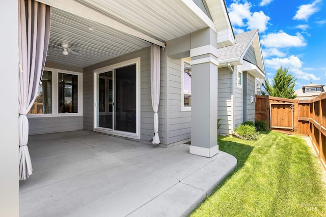 10685 W Evelia St, Boise, ID 83709 - view of patio / terrace featuring ceiling fan and a gate