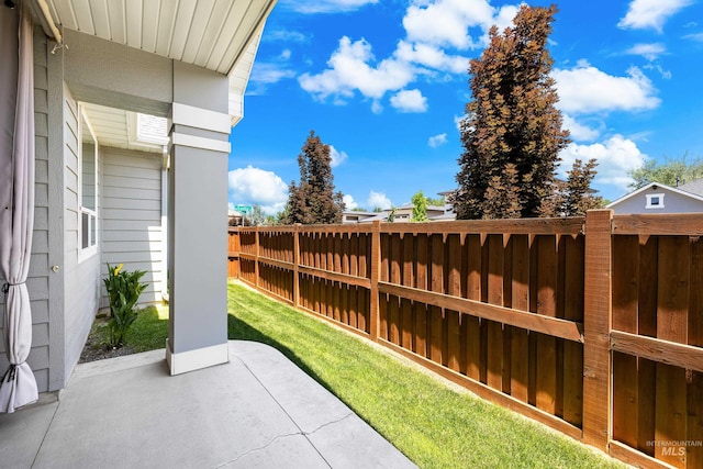 10685 W Evelia St, Boise, ID 83709 - fenced backyard with a patio