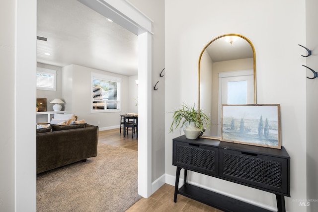 10685 W Evelia St, Boise, ID 83709 - hallway with wood finished floors and baseboards