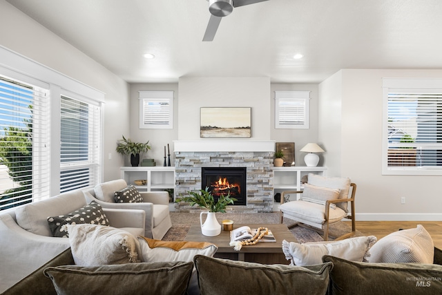 10685 W Evelia St, Boise, ID 83709 - living area with a fireplace, ceiling fan, wood finished floors, and recessed lighting