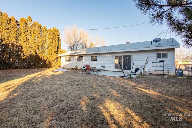 rear view of house featuring a patio