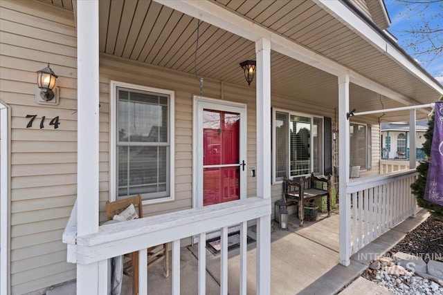 entrance to property with a porch